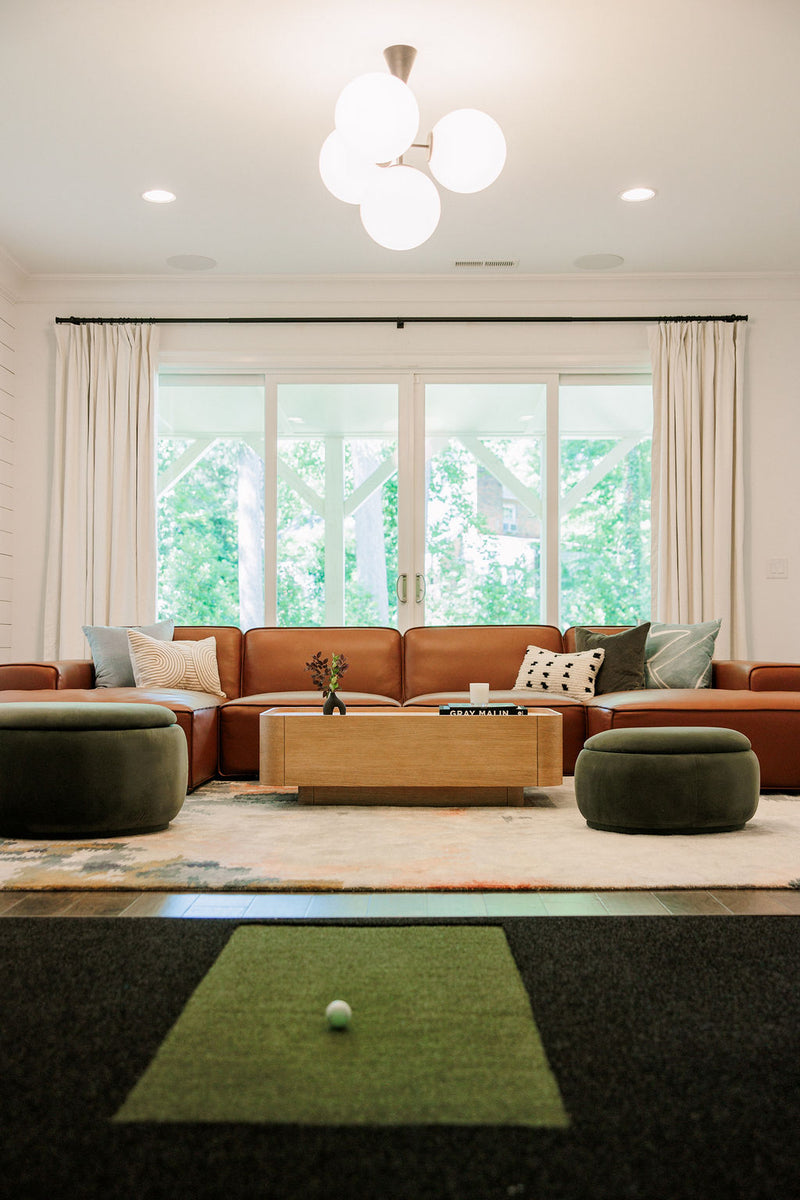Luxury home golf simulator install with Uneekor and custom turf in Raleigh, NC